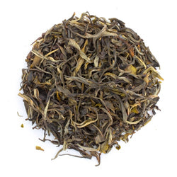 Pu'Erh Bu Lang 2013 (Raw) - Dark Tea from China Tandem Tea Company Leaves